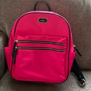 Bright pink Kate spade backpack